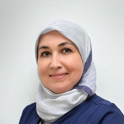 Dentist Abber Chakfa Smiling In Hijab