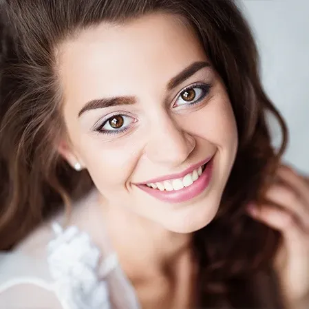 Woman After Cosmetic Dentistry Services